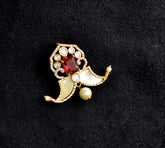 PENDANT SET / LOCKETS TIGERNAIL LOCKET 125 GOLDEN STONE RUBY